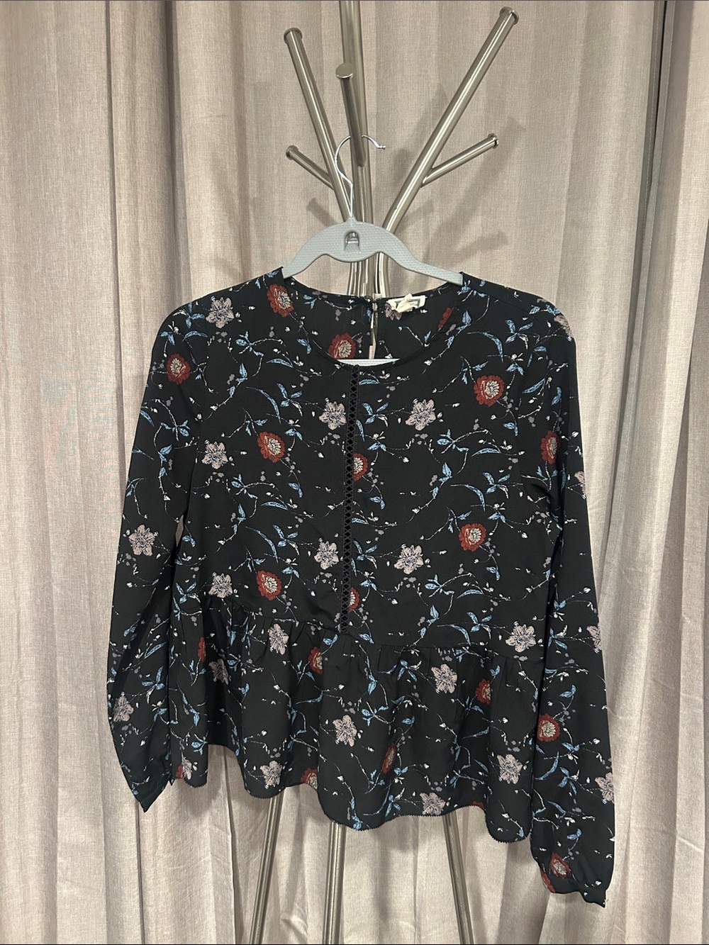 Black Floral Peplum Blouse with Long Sleeves and Button Detail